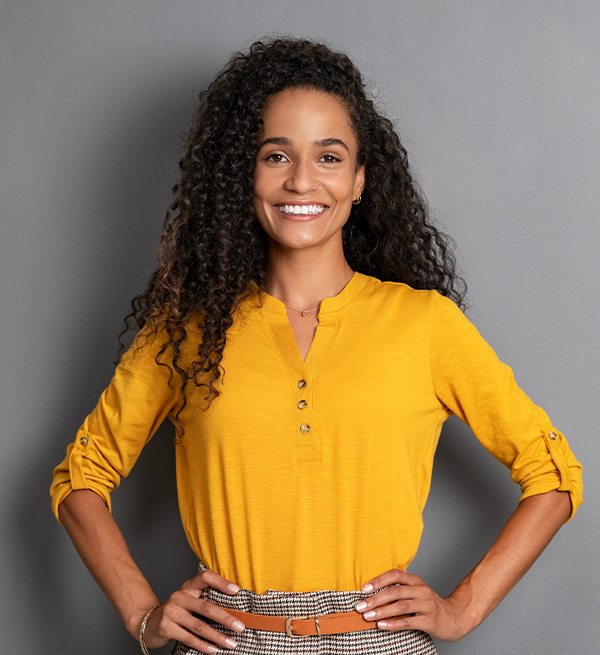 Hispanic woman with a bright shirt
