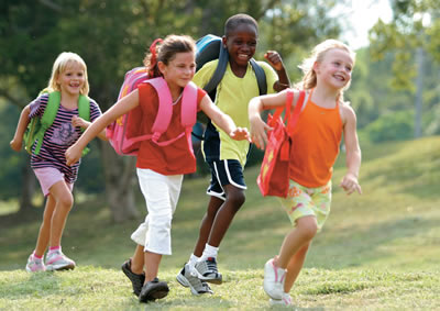 Diverse children walking to school.