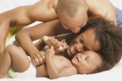 african american couple and babie